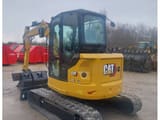 2023 Caterpillar 305 CR crawler excavator, rear three-quarter view