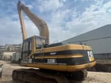 1998 Caterpillar 320BL crawler excavator, rear three-quarter view