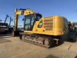 2018 Caterpillar 320 crawler excavator, rear three-quarter view