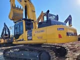 2025 Komatsu PC450 crawler excavator, rear three-quarter view