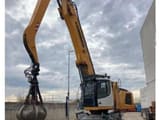 2017 Liebherr LH40 M material handler, front three-quarter view