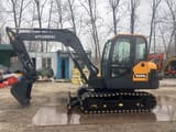 2024 Hyundai HX60N mini excavator, side view