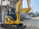 2022 Komatsu PC-55MR mini excavator, side view