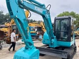 2023 Kobelco SK60 crawler excavator, front three-quarter view