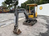 2000 Volvo EB12 mini excavator, front three-quarter view