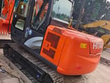 2024 Hitachi ZX60 mini excavator, rear three-quarter view