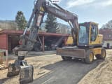 2005 Volvo EW140B wheel excavator, front three-quarter view