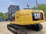 Caterpillar 320GC crawler excavator, rear three-quarter view