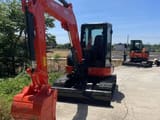Kubota KX163 mini excavator, front three-quarter view