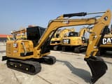 2023 Caterpillar 305.5E2 mini excavator, side view