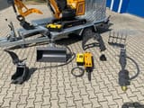 Berger Kraus BK1300JSR mini excavator with attachments on trailer