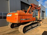 2013 Doosan DX255LC-3 crawler excavator, rear three-quarter view