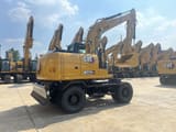 2026 Caterpillar M315GC wheel excavator, rear three-quarter view