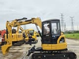 2022 Caterpillar 305C CR mini excavator, side profile view