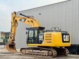 2012 Caterpillar 329E crawler excavator, side view