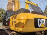2020 Caterpillar 336D crawler excavator, rear three-quarter view