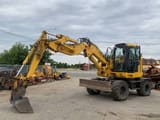 2018 Komatsu PW118MR-11W wheel excavator, side profile view