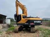 Hyundai 220LC-9 crawler excavator rear three-quarter view