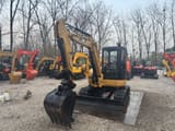 2023 Caterpillar 305C CR mini excavator, front three-quarter view