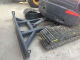 Kubota U55 mini excavator back view with blade