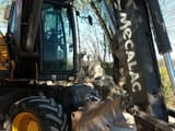 2006 Mecalac 714 MW wheel excavator, side view
