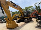 2015 Caterpillar 325CL crawler excavator, front three-quarter view