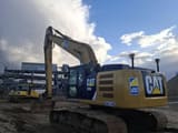 2013 Caterpillar 329E crawler excavator, rear three-quarter view