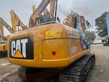 Escavatore cingolato Caterpillar 320DL del 2022, vista posteriore