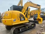 2024 Komatsu PC70-8 mini excavator, rear three-quarter view