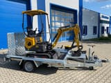 Berger Kraus BK1000JSR mini excavator on a trailer, side view