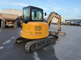 2021 Caterpillar 305E2 crawler excavator, rear three-quarter view