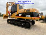 2023 Caterpillar 320CL crawler excavator, rear three-quarter view