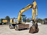 2007 New Holland MH-PLUS wheel excavator, side profile view