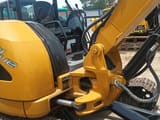 2024 Caterpillar 304C mini excavator cab and boom view