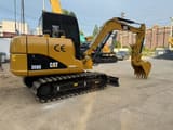 2016 Caterpillar 306D mini excavator, side profile view