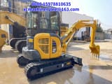 2023 Komatsu PC35 MR mini excavator, front three-quarter view