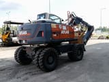 2013 Atlas 150W wheel excavator, rear three-quarter view