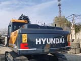 2022 Hyundai 210-9S crawler excavator, rear three-quarter view