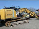 2012 Caterpillar 320E crawler excavator, side view