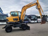 2014 Hyundai R55W-9 wheel excavator, side profile view