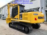 2024 Komatsu PC200 crawler excavator, rear three-quarter view
