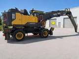 2021 Volvo EW240EMH material handler, side view
