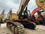 2024 Caterpillar 374FL crawler excavator, low-angle side view