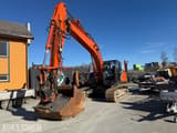 2022 Hitachi ZX210LC-7 crawler excavator, front three-quarter view
