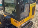 2022 JCB 19C-1 mini excavator cab side view