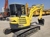 2023 Yanmar ViO55 mini excavator, front three-quarter view