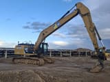 2013 Caterpillar 329E crawler excavator side view