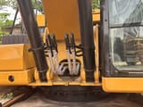 2022 Caterpillar 330GC crawler excavator boom and cab detail