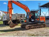Doosan DX140LC-5 crawler excavator, side view