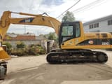 Caterpillar 320CL crawler excavator, side profile view
